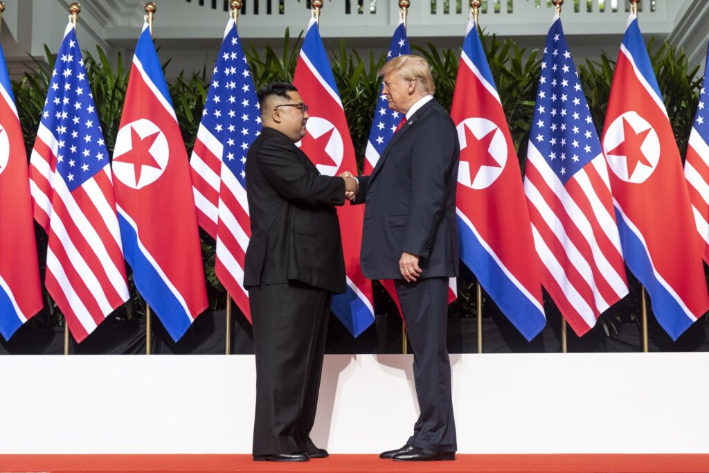 Decenija vladavine Kim Džong Una Kim And Trump Shaking Hands At The Red Carpet During The DPRK–USA Singapore Summit 1024x683