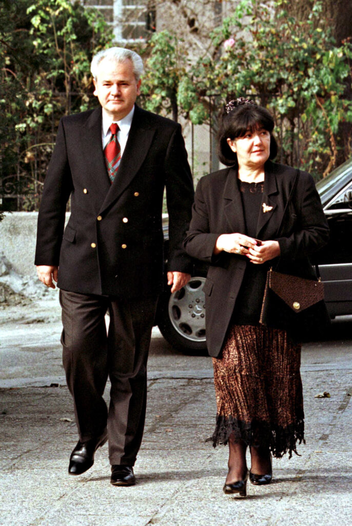 FILE-Mirjana Markovic,right, the wife of the former Yugoslav President Slobodan Milosevic,left, is seen in this TSeptember 17 1996 FILE photo. Mirjana Markovic failed to return from her self-imposed exile in Russia for her corruption trial on Thursday Sept 15 2005 in Belgrade, and the judge immediately ordered her arrest.(AP Photo / Srdjan Ilic)
